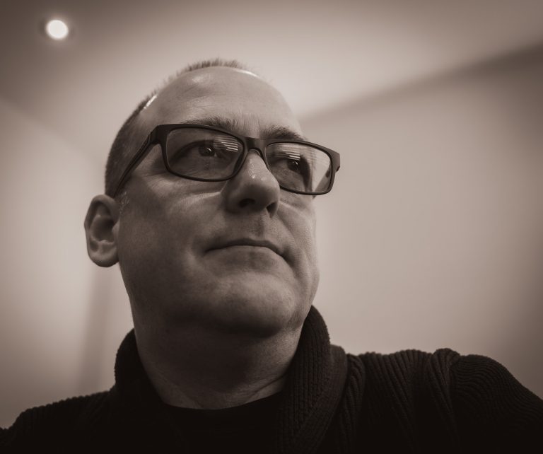 An image of me wearing glasses