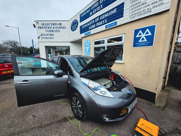 Nissan Leaf with enginge compartment open and attached to Battery Support Unit