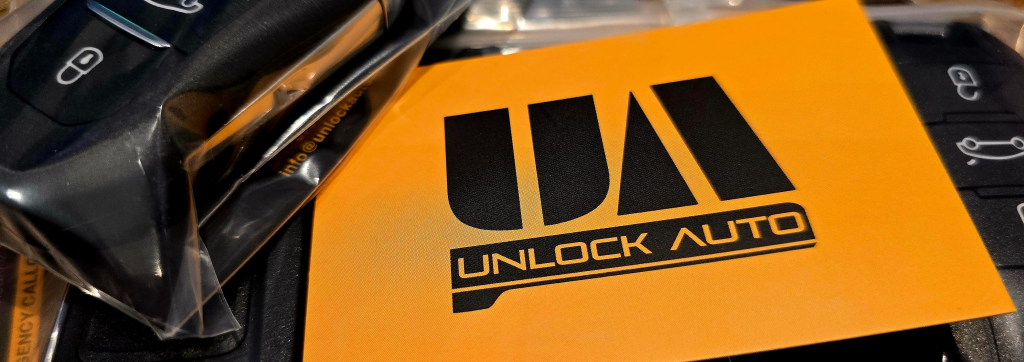Unlock Auto business card in amongst various car keys